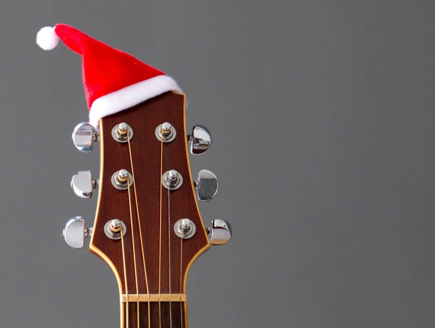 guitar with a santa hat