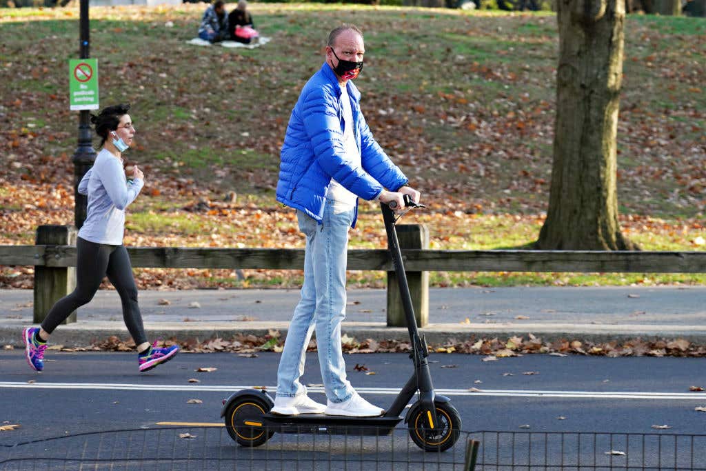 Man wearing mask in park