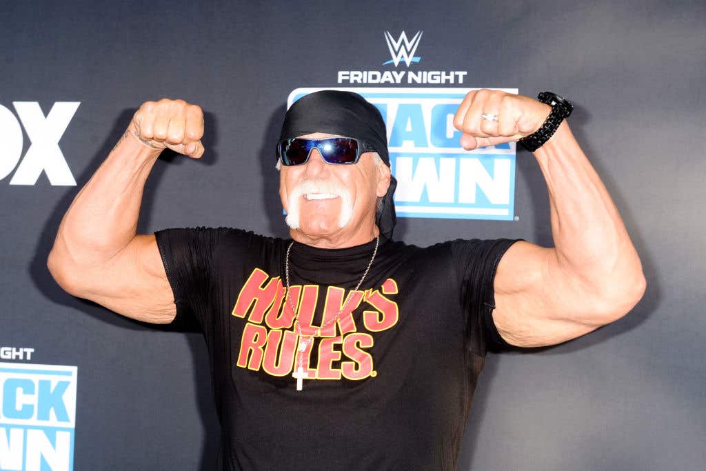 Hulk Hogan flexing. Hulk Hogan rescued a teen from a flipped car