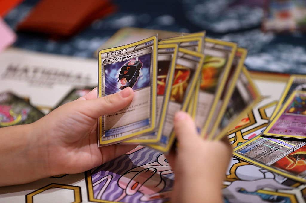 Pokémon trading cards at the Pokémon World Championship. Why Was A Pokémon World Championship Finalist Disqualified During A Match?