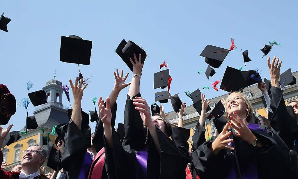 College students throwing their graduation caps in the air. Did A Student Have A NSFW Name During A College Graduation Ceremony?