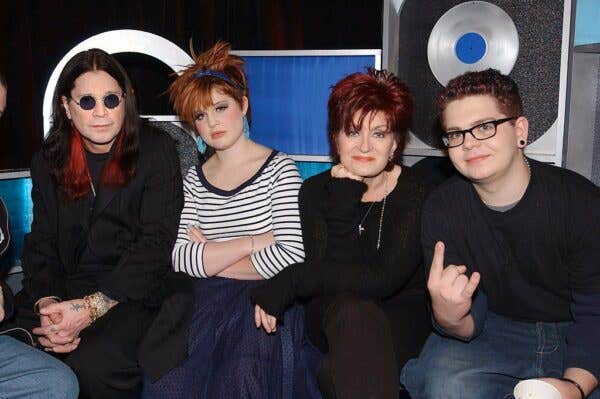 The Osbourne family sitting down backstage at TRL at the MTV Studios in New York City