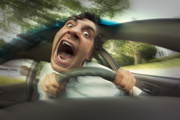 Silly man gets into car crash and makes ridiculous face