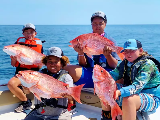 Kids with red snapper