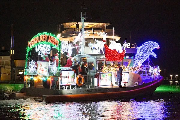 Large boat brightly illuminated with christmas lights for Fun This Weekend In SWFL
